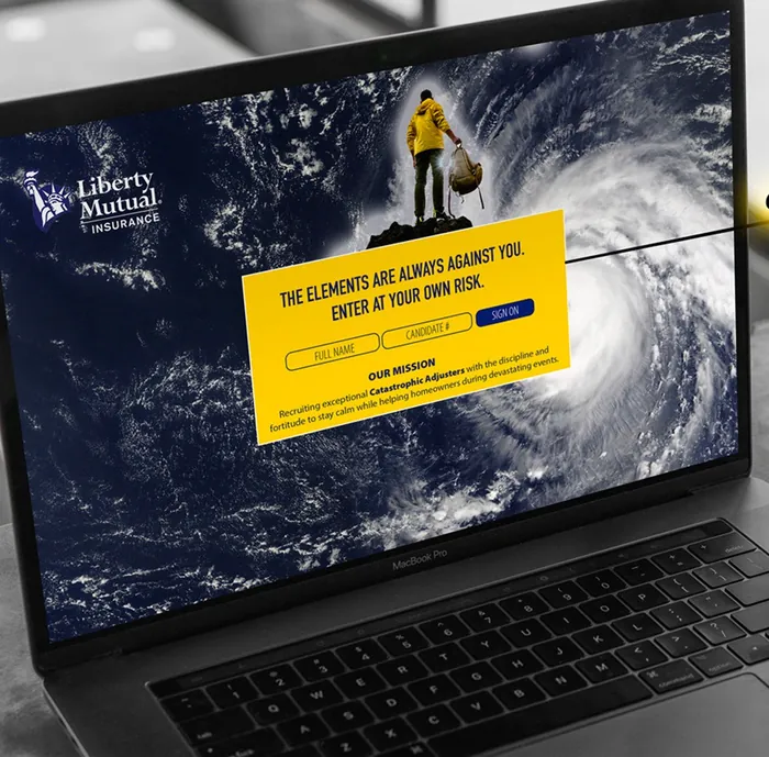 Liberty Mutual catastrophe adjuster microsite on a laptop over a hurricane satellite image